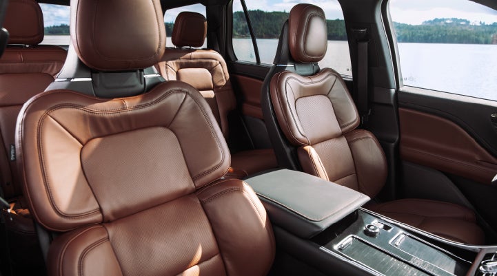 The front row's Perfect Position Seats in a 2024 Lincoln Aviator® Reserve model with Ebony Roast interior | West Point Lincoln in Houston TX