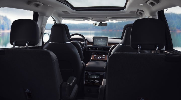 The interior of a 2024 Lincoln Aviator® SUV from behind the second row | West Point Lincoln in Houston TX