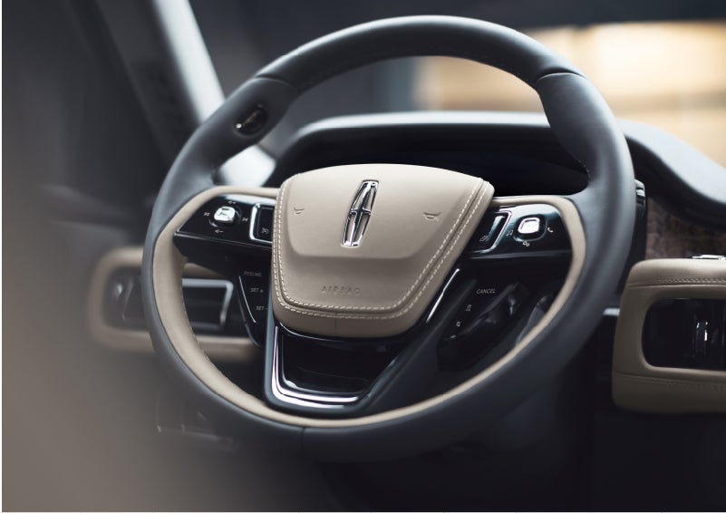 The intuitively placed controls of the steering wheel on a 2023 Lincoln Aviator® SUV | West Point Lincoln in Houston TX